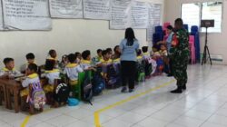 Babinsa Koramil 1710-02/Timika Dampingi Pelaksanaan Makan Bergizi Gratis (MBG) Di Wilayah Binaannya